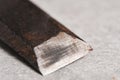 Sharpened blade of an old rusty chisel. Royalty Free Stock Photo