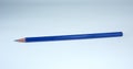 Sharpened blue pencil on white background Royalty Free Stock Photo