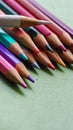 sharpened color pencil tips on a green background Royalty Free Stock Photo