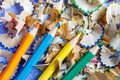 Sharpened colored pencils and pencil shavings Royalty Free Stock Photo