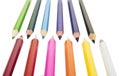 Sharpened colored pencils on the white background. Royalty Free Stock Photo