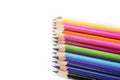 Sharpened colored pencils on the white background. Royalty Free Stock Photo