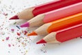 Sharpened colorful pencils and wood shavings, drawing concept Royalty Free Stock Photo