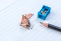 Sharpened pencel with sharpener Royalty Free Stock Photo