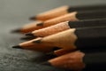 Sharpened pencils  on a moody background. Royalty Free Stock Photo