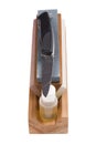 Sharpener stone and knife on white background Royalty Free Stock Photo