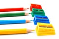 Sharpeners and pencils on a white background. Royalty Free Stock Photo