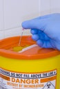 Sharps container needle disposal Royalty Free Stock Photo