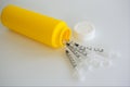 Sharps container for used medical syringes.