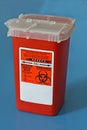 Sharps container for used needles Royalty Free Stock Photo