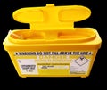 Sharps needle container Royalty Free Stock Photo