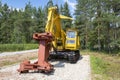 Feller buncher machine on a caterpillar chassis. Forest Museum Royalty Free Stock Photo