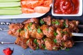 Shashlik shish kebab of meat pork on skewers with vegetables and ketchup. Royalty Free Stock Photo