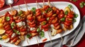 Shashlik on skewer with red sauce