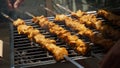 Shashlik - traditional Georgian barbecue. Closeup of raw roasted marinated meat barbecue shish kebab shashlik on steel metal Royalty Free Stock Photo