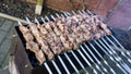 Shashlik - traditional russian barbecue. meat on barbeque. smo