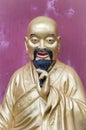 Golden Buddha figure at the Ten Thousand Buddhas Monastery, Hong