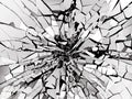 Shattered or demolished glass over black background