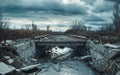 The shattered remains of a once sturdy bridge span a turbulent river, the damaged structure a haunting testament to the