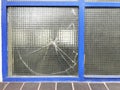 Shattered wire mesh or wired safety glass Royalty Free Stock Photo