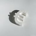 Euro Symbol on White Background Covered with Dust