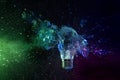 shattering bulb on black background Royalty Free Stock Photo