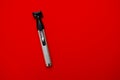 Shaver on a red background Royalty Free Stock Photo