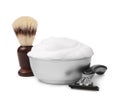 Shaving brush, foam and razor on white background Royalty Free Stock Photo
