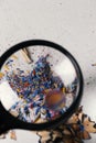 Shaving of colored pencils seen with a magnifying glass with a psychedelic look of colors with distortion of the look, as seen wit Royalty Free Stock Photo