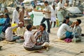 Shaving Men in Varanasi Ghat, India Royalty Free Stock Photo