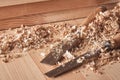 Shaving plane wooden shavings hammer flat chisels construction concept. Royalty Free Stock Photo