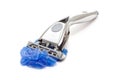 Shaving razor with blue foam Royalty Free Stock Photo
