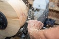 Shavings and sawdust flying around while wood turnery