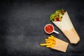 Shawarma with French Fries and Ketchup on Copy Space Royalty Free Stock Photo