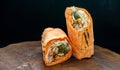 Shawarma fresh roll of lavash, chicken beef shawarma falafel, grilled meat, mushrooms, cheese.