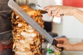 Shawarma meat being cut Royalty Free Stock Photo