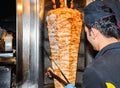 Shawarma, roasted on a slowly-turning vertical rotisserie or spit. Chicken, beef, lamb pork