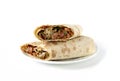 Shawarma, roll in lavash , grilled meat, with vegetables, sandwich , cut on a white background, horizontal, copy spase