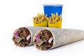 Shawarma sandwich fresh roll of, Grilled Meat and salad tortilla wrap with white sauce With Drink And Fries. Royalty Free Stock Photo