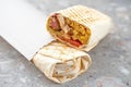 Shawarma sandwich gyro fresh roll of lavash, pita bread chicken beef shawarma falafel Royalty Free Stock Photo