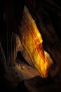 Shawl formation in limestone cave by background illumination