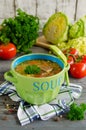 Shchi - traditional russian cabbage soup on a wooden table