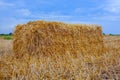 Sheaf of hay, a rectangular shape is the slant, a wheat field.