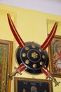 Sheath hanging on the wall with two swords, crossing it, Symbol of a Hindu military caste claiming Kshatriya descent Royalty Free Stock Photo