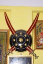 Sheath hanging on the wall with two swords, crossing it, Symbol of a Hindu military caste claiming Kshatriya descent Royalty Free Stock Photo