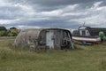 Shed made out of an old upturned boat Royalty Free Stock Photo