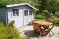 Shed with terrace and garden furniture