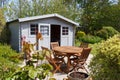 Shed with terrace and garden furniture