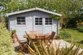 Shed with terrace and garden furniture