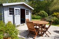 Shed with terrace and garden furniture